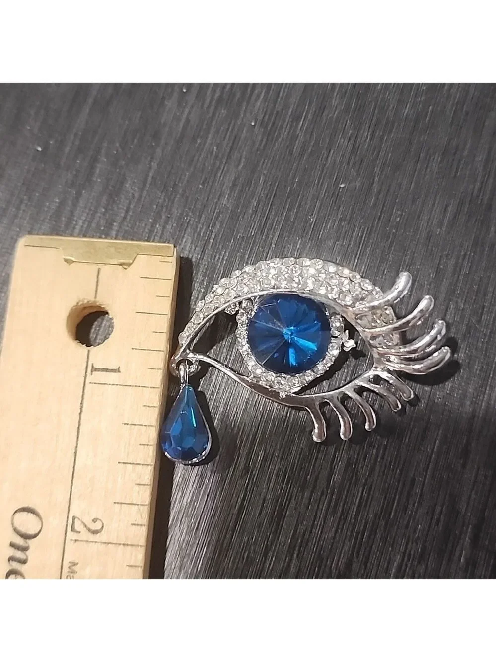 Silvertone Blue Eye Brooch